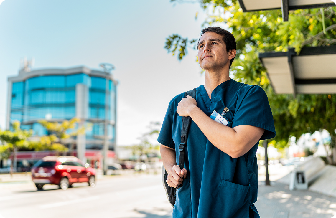 Woman crossed arms in front of laptop