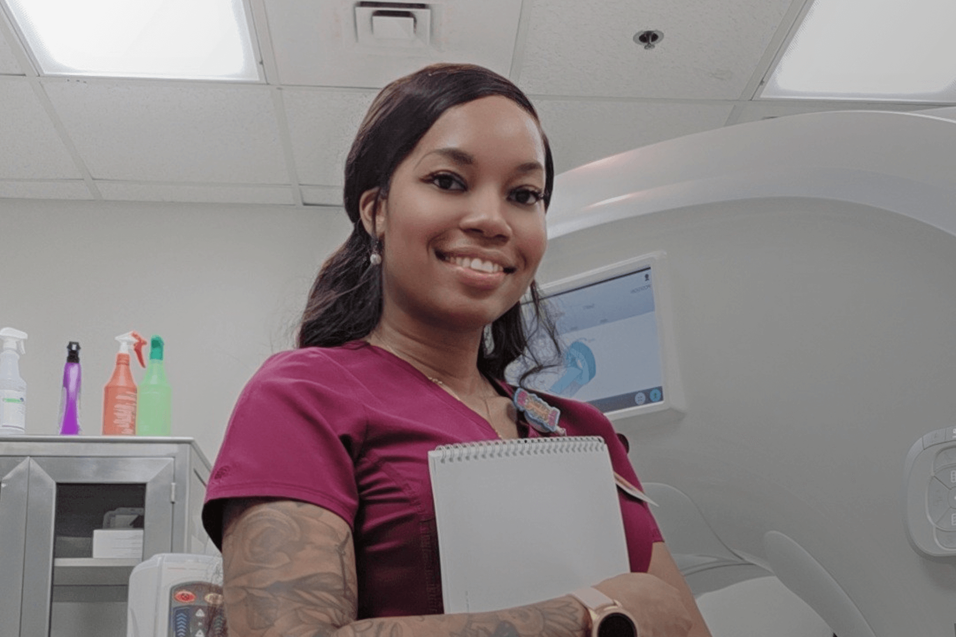 Nurse holding phone towards scanner
