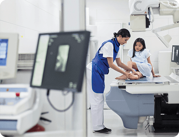 Image of a nurse helping a patient